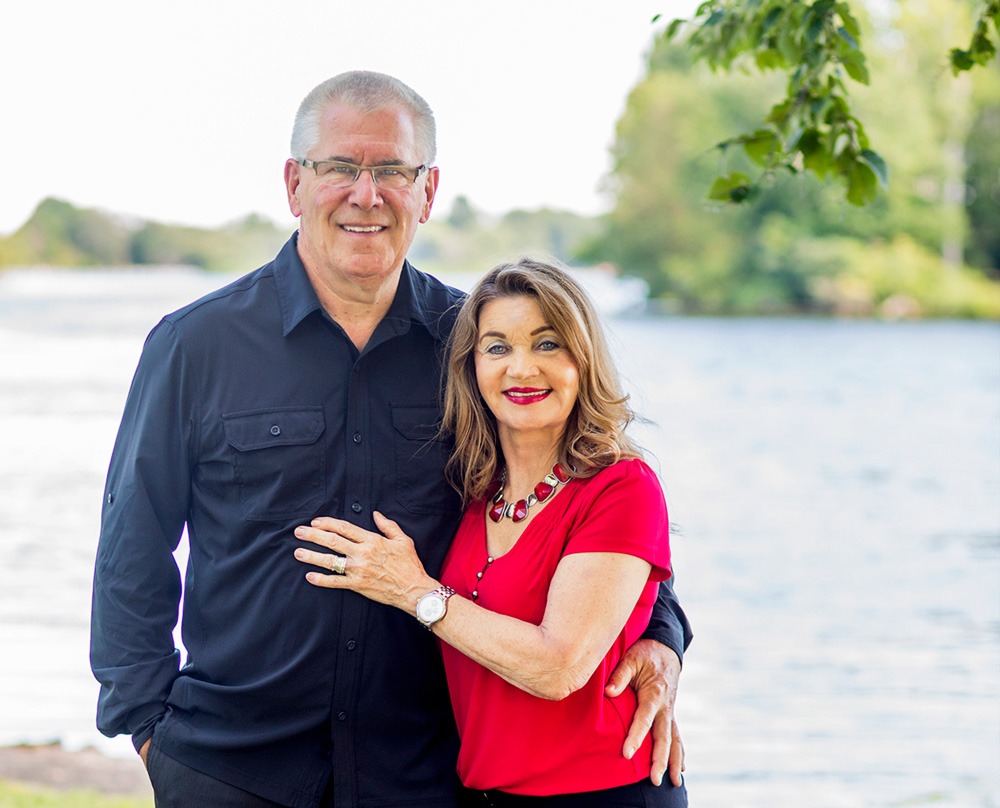 Deborah and Wayne McCuen by the river